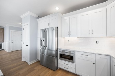 Stunning first-floor beachfront condo ideally positioned on a - photo 6