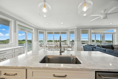 Stunning first-floor beachfront condo ideally positioned on a - photo 7