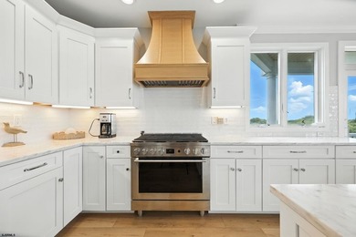 Stunning first-floor beachfront condo ideally positioned on a - photo 8