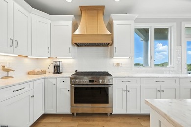 Stunning first-floor beachfront condo ideally positioned on a - photo 8