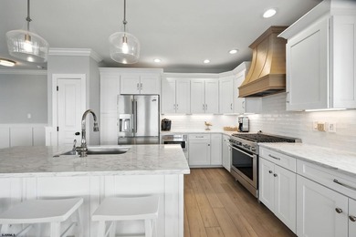 Stunning first-floor beachfront condo ideally positioned on a - photo 9