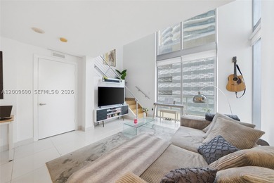 Unique split-level duplex loft in the heart of Brickell. The - photo 2
