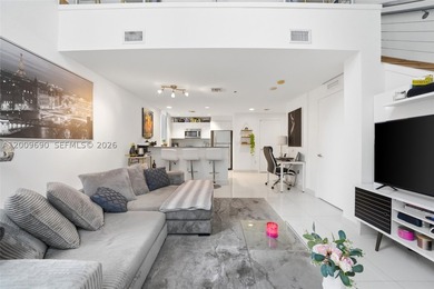 Unique split-level duplex loft in the heart of Brickell. The - photo 3
