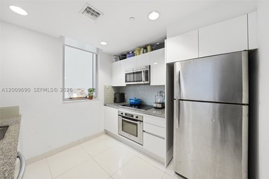 Unique split-level duplex loft in the heart of Brickell. The - photo 5