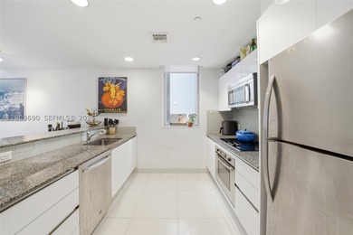 Unique split-level duplex loft in the heart of Brickell. The - photo 7