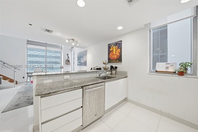 Unique split-level duplex loft in the heart of Brickell. The - photo 8