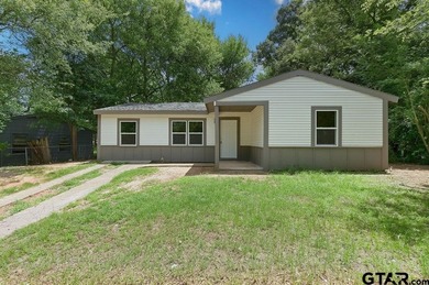 Renovated and Move-in ready! This 4-bedroom, 1-bath home offers - photo 1