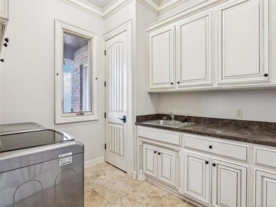 This one-of-a-kind enclave in Jenks is an estate resting on a - photo 41