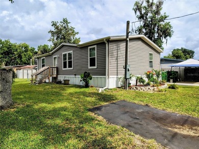 Situated on a corner lot is this newer home that has the perfect - photo 1