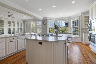 Kayak from your backyard. Room for a pool. Two primary suites