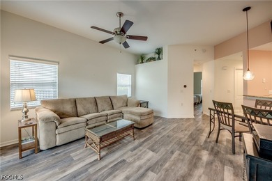 Sunshine, lake views, and easy Florida living. This first-floor - photo 7
