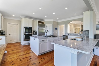 Kayak from your backyard. Room for a pool. Two primary suites