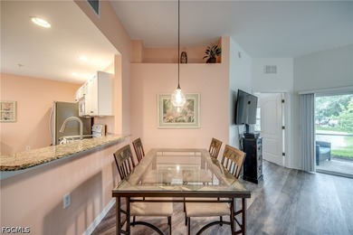 Sunshine, lake views, and easy Florida living. This first-floor - photo 9