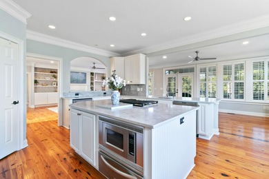 Kayak from your backyard. Room for a pool. Two primary suites