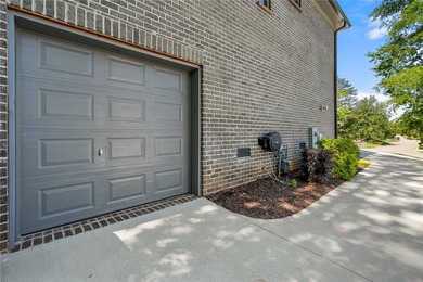 Constructed with a brick and stone exterior and highlighted by - photo 34