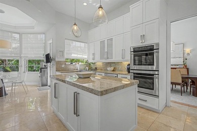 Sophistication meets functionality w/ this spectacular 5 bdrm - photo 10