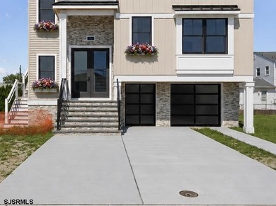 Experience exceptional coastal living in this stunning new - photo 3