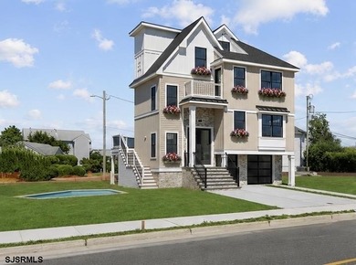 Experience exceptional coastal living in this stunning new - photo 4