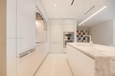 Rising 52 stories above Miami, this move-in ready 1,699 SF