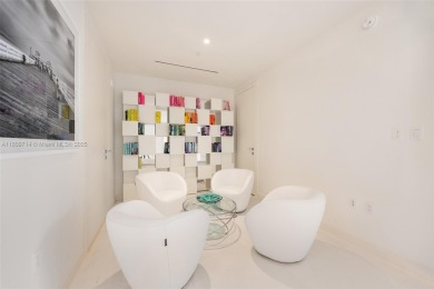 Rising 52 stories above Miami, this move-in ready 1,699 SF