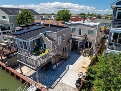Turnkey waterfront investment opportunity! This fully renovated - photo 2