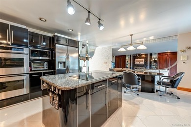 This expansive 4,937-square-foot residence is situated on a - photo 10