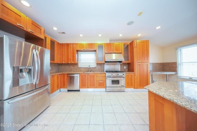 Welcome to this beautiful two-family home in the highly - photo 13