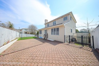 Welcome to this beautiful two-family home in the highly - photo 14