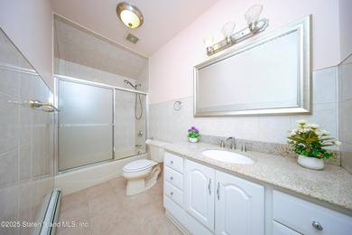 Welcome to this beautiful two-family home in the highly - photo 16