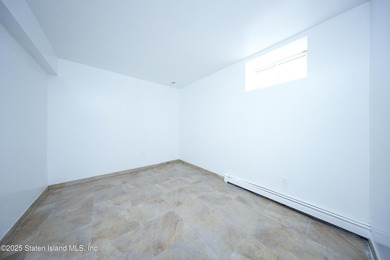 Welcome to this beautiful two-family home in the highly - photo 18