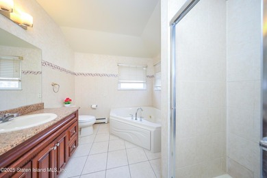 Welcome to this beautiful two-family home in the highly - photo 21
