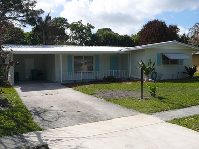 BEAUTIFUL 2/2 WITH CARPORT, CONCRETE BLOCK, NEW METAL ROOF AND - photo 2