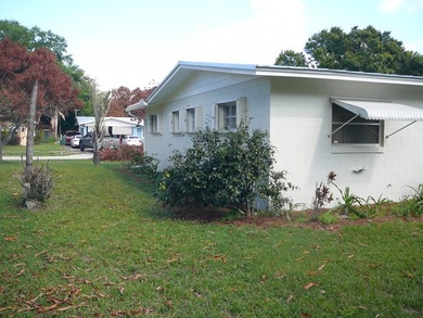 BEAUTIFUL 2/2 WITH CARPORT, CONCRETE BLOCK, NEW METAL ROOF AND - photo 5