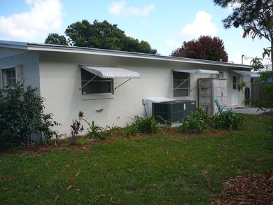BEAUTIFUL 2/2 WITH CARPORT, CONCRETE BLOCK, NEW METAL ROOF AND - photo 6