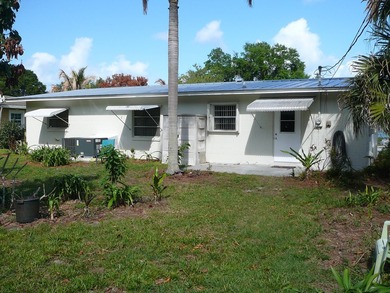BEAUTIFUL 2/2 WITH CARPORT, CONCRETE BLOCK, NEW METAL ROOF AND - photo 7