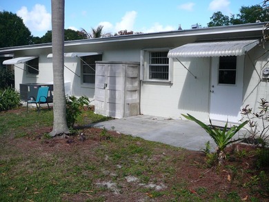 BEAUTIFUL 2/2 WITH CARPORT, CONCRETE BLOCK, NEW METAL ROOF AND - photo 8