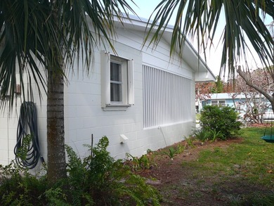 BEAUTIFUL 2/2 WITH CARPORT, CONCRETE BLOCK, NEW METAL ROOF AND - photo 9