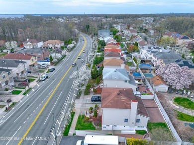 Welcome to this beautiful two-family home in the highly - photo 31
