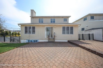 Welcome to this beautiful two-family home in the highly - photo 32