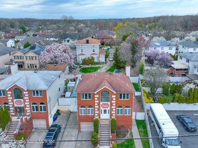 Welcome to this beautiful two-family home in the highly - photo 35