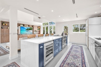 Exceptional fully renovated two-story residence featuring a - photo 3