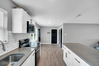 Recently renovated home on corner lot in established - photo 12