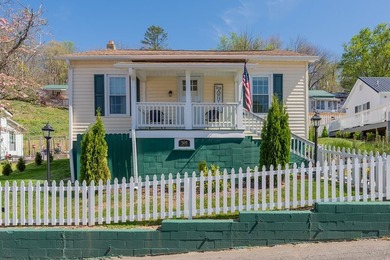This adorable bungalow in the quaint town of Fries, Virginia is - photo 9