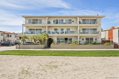 Wake up to sweeping bayfront views in this beautifully updated - photo 2