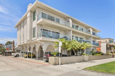 Wake up to sweeping bayfront views in this beautifully updated - photo 3