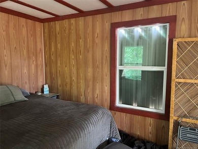 AFFORDABLE WATER VIEW CABIN located in Blue Water Oaks. Take a - photo 7