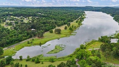 Nestled just a one-minute walk from beautiful Lake Ludwig, this - photo 13