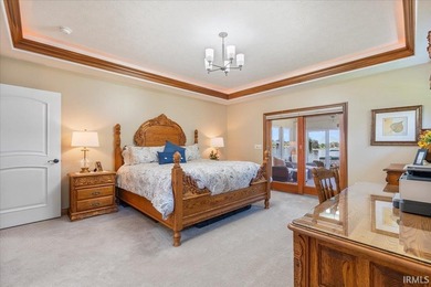 Experience exceptional lakefront living in this custom-built - photo 14