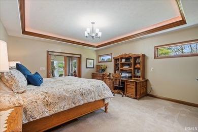 Experience exceptional lakefront living in this custom-built - photo 16