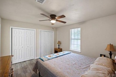 Nestled just a one-minute walk from beautiful Lake Ludwig, this - photo 17